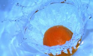 orange-splashing-on-water-1322587-660x395