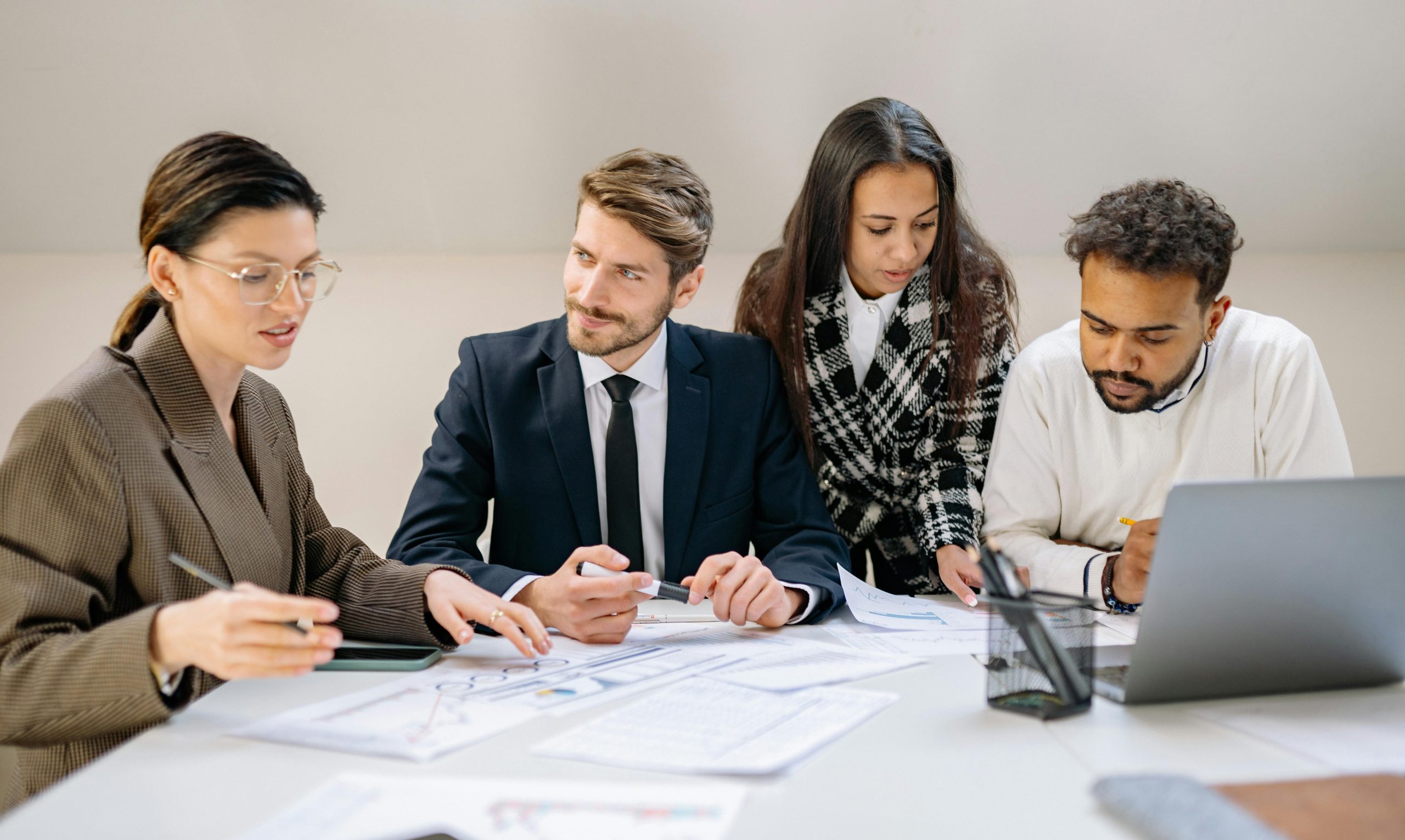 Photo by Yan Krukau: https://www.pexels.com/photo/men-and-women-sitting-at-table-with-documents-7691730/